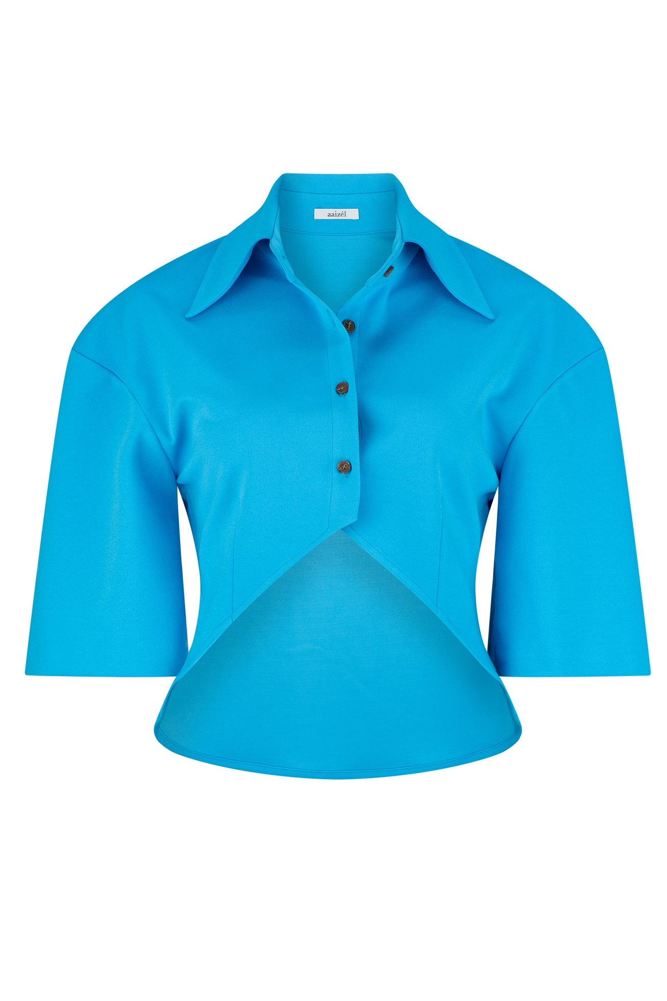 Flat lay of blue button down shirt with cornered hem, large collar and boxy sleeves.
