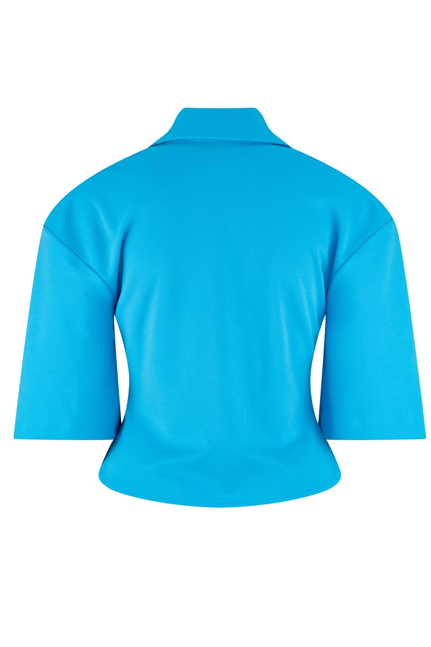 Flat lay of blue button down shirt with cornered hem, large collar and boxy sleeves.