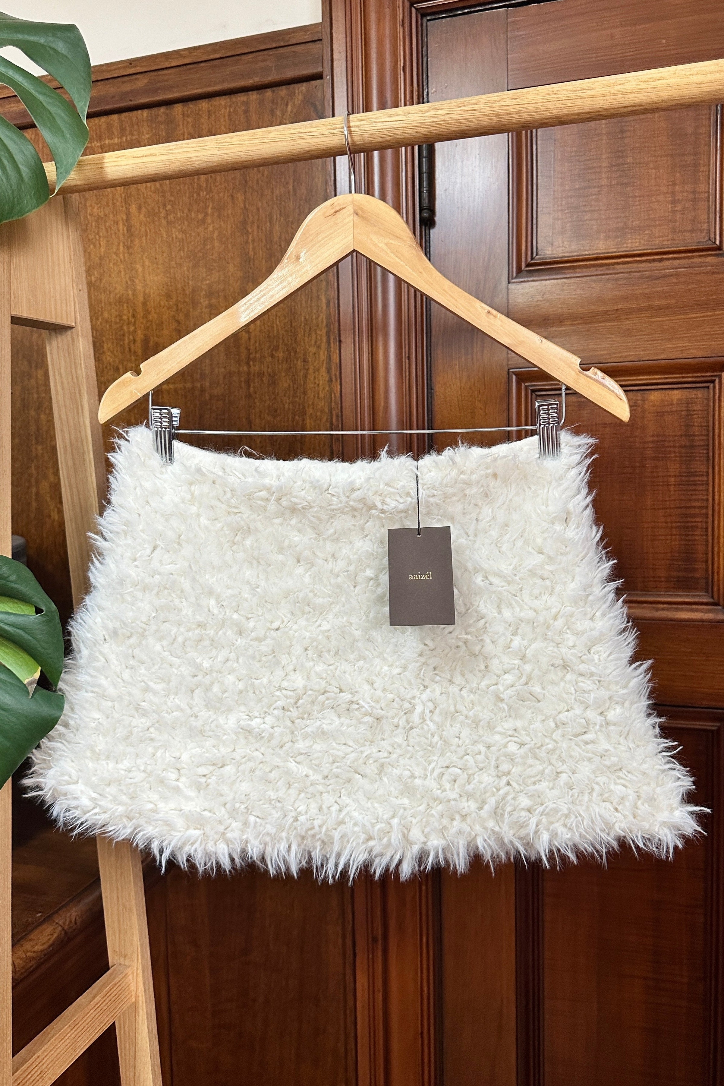 White fur mini skirt. Winter essential.